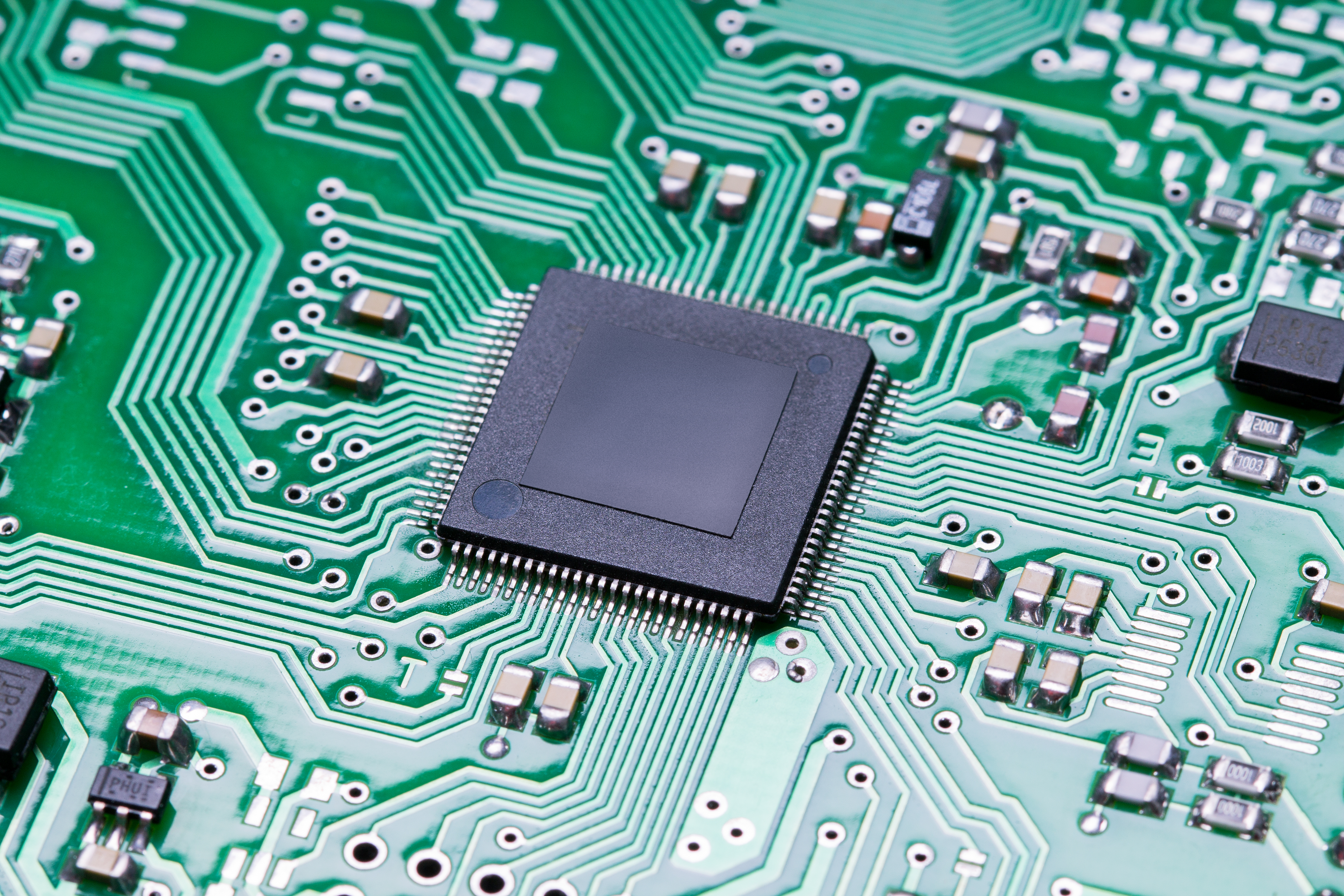 Close up microchip of a printed circuit board